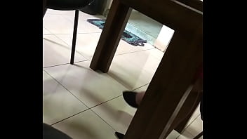 UNDER THE DINING TABLE FLATS DANGLING- Part 1 (This was recorded during the lunch break.she was sitting right next my table. I saw she was give ing some stunning foot play.please enjoy and comment on this video for many more.